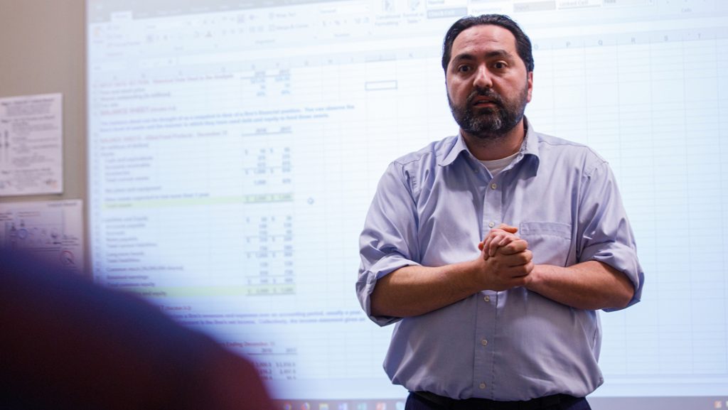 Professor in front of classroom