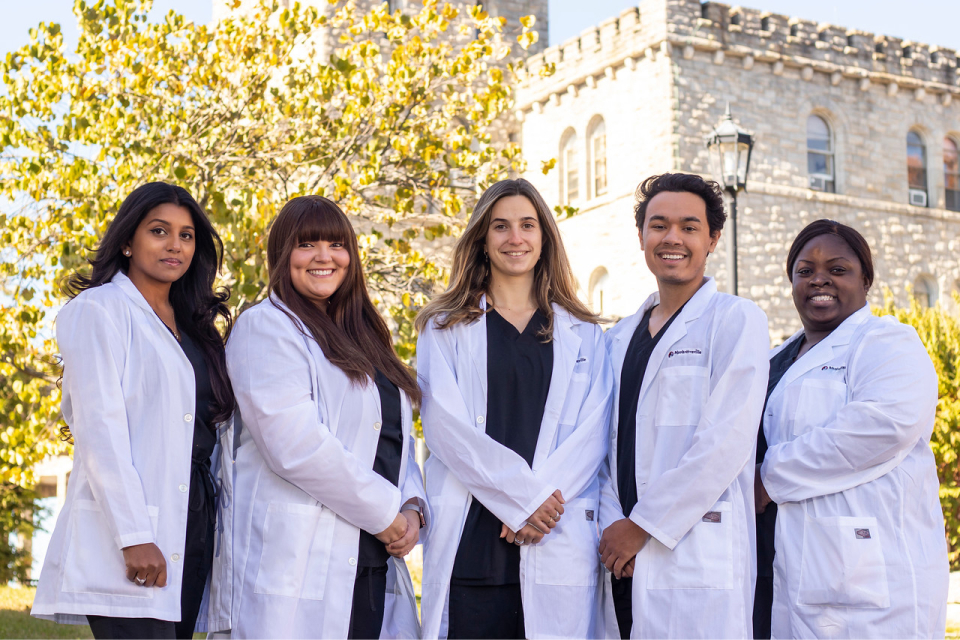 nursing students smiling at camera